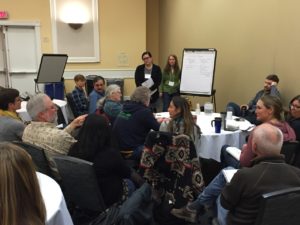 Participants discuss at the 2016 Pacific Northwest Organic Plant Breeding Symposium